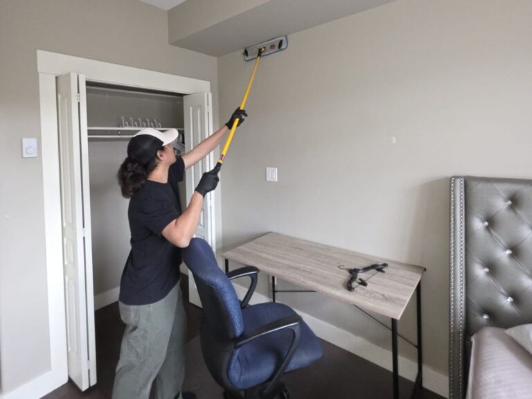 Professional house cleaning services in Vancouver cleaning a modern living room