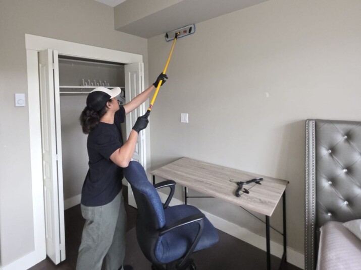 Professional house cleaning services in Vancouver cleaning a modern living room